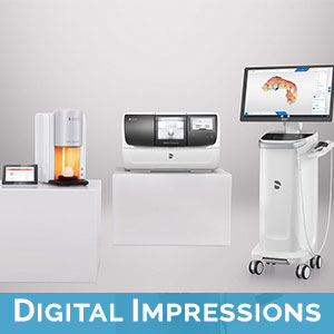 The image shows a display of various dental equipment and technology, including a digital impression machine, a 3D scanner, and a computer monitor, placed on a white stand against a neutral background.